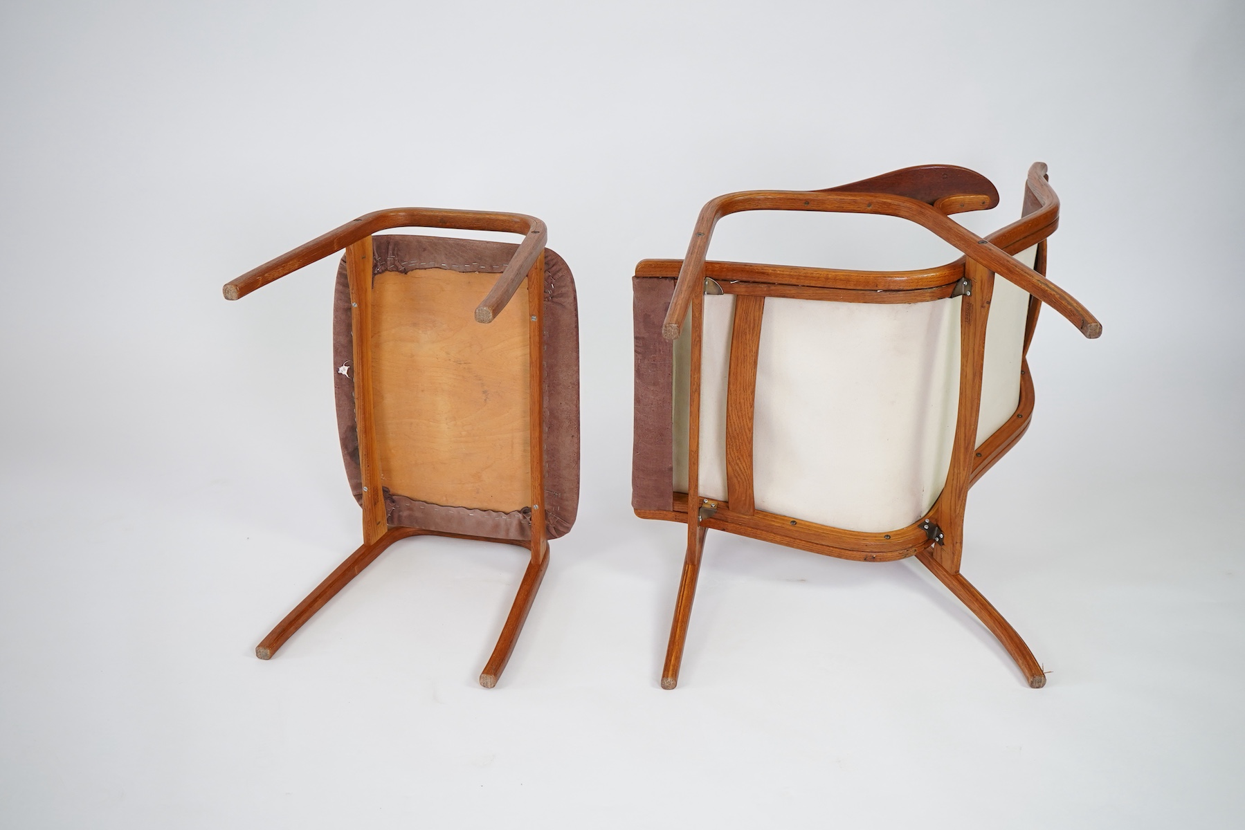 Yngve Ekström (Swedish, 1913-1998) for Swedese Möbler AB: A 'Lamino' oak lounge chair and ottoman